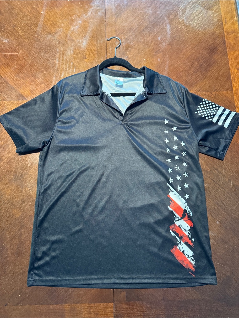 Men's Black Polo with Star Graphic & Red Accent